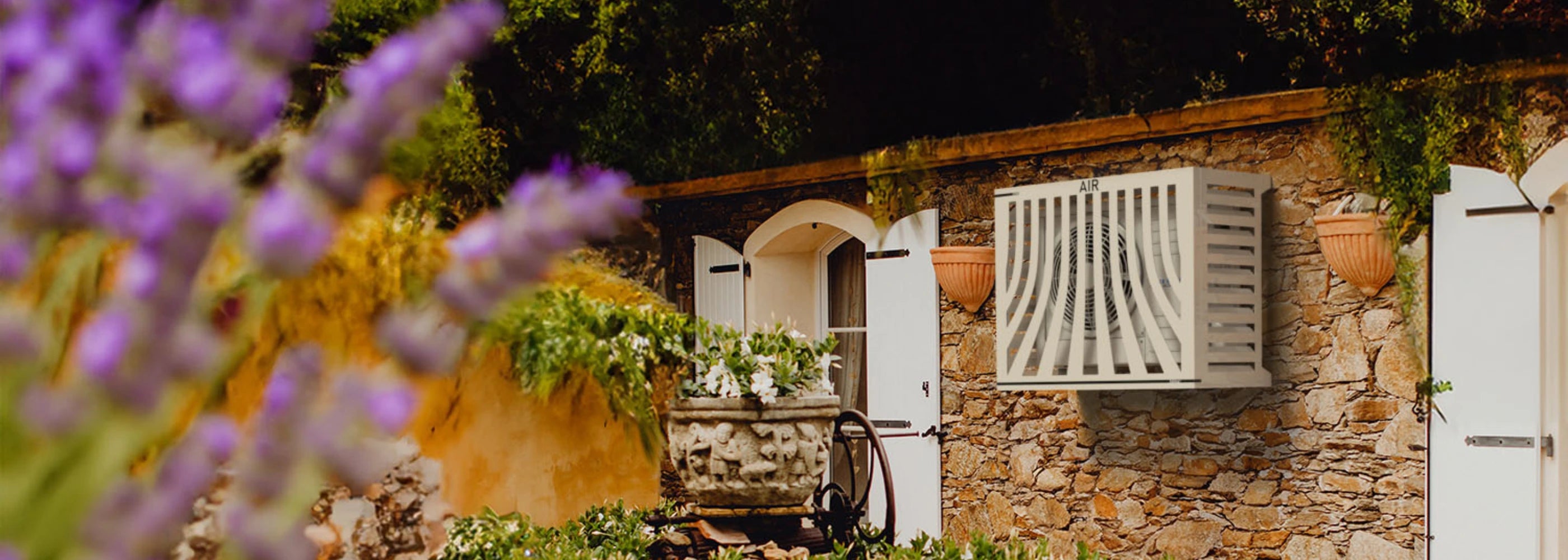Air conditioner wall cover on rustic stone house. Stylish solution for outdoor ACs by LG, Daikin, Panasonic.