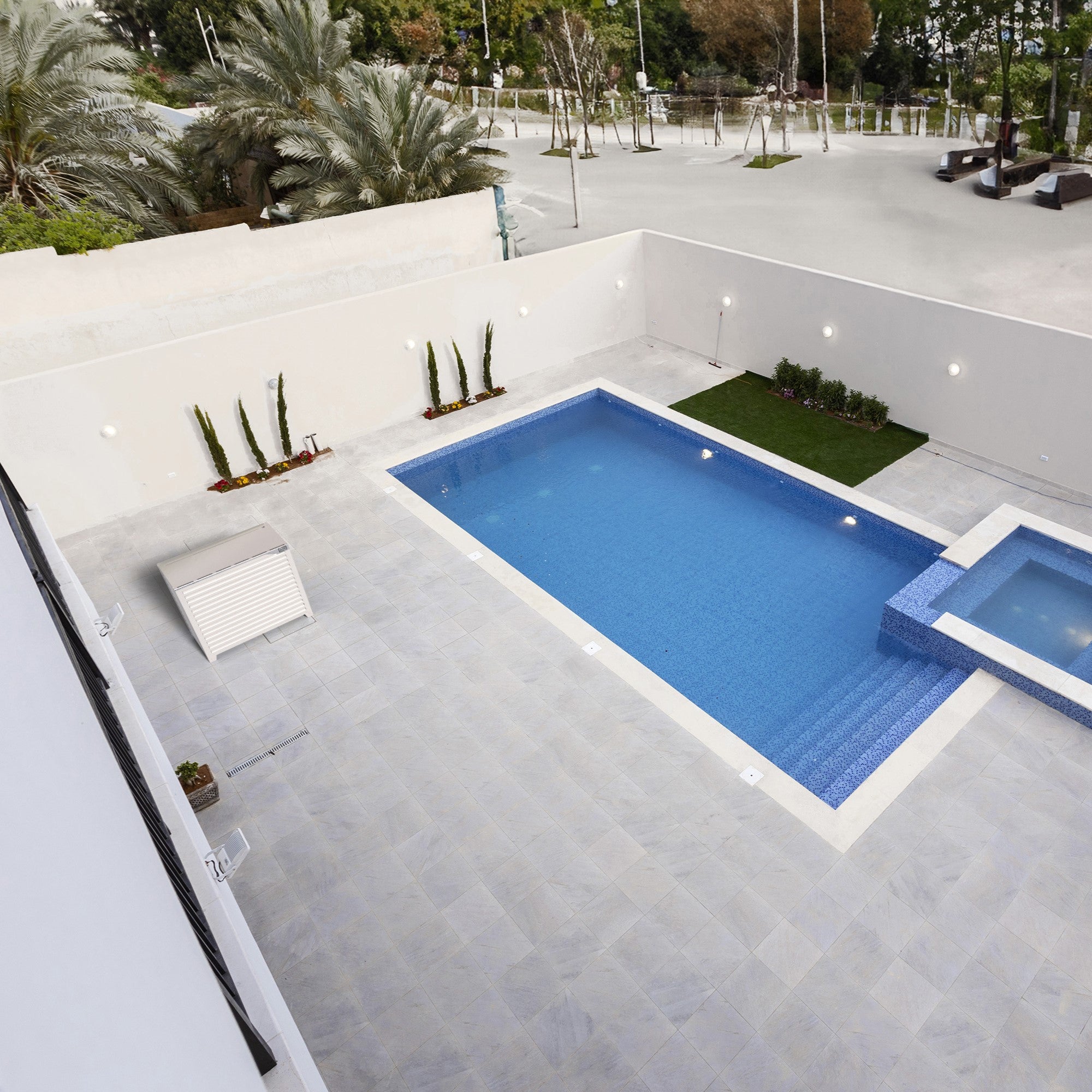 Sleek white Big Blade 3XL heat pump cover installed by pool – modern aesthetic and UV/weather protection. optimized for use with Mitsubishi PUHZ-SW120YHA.