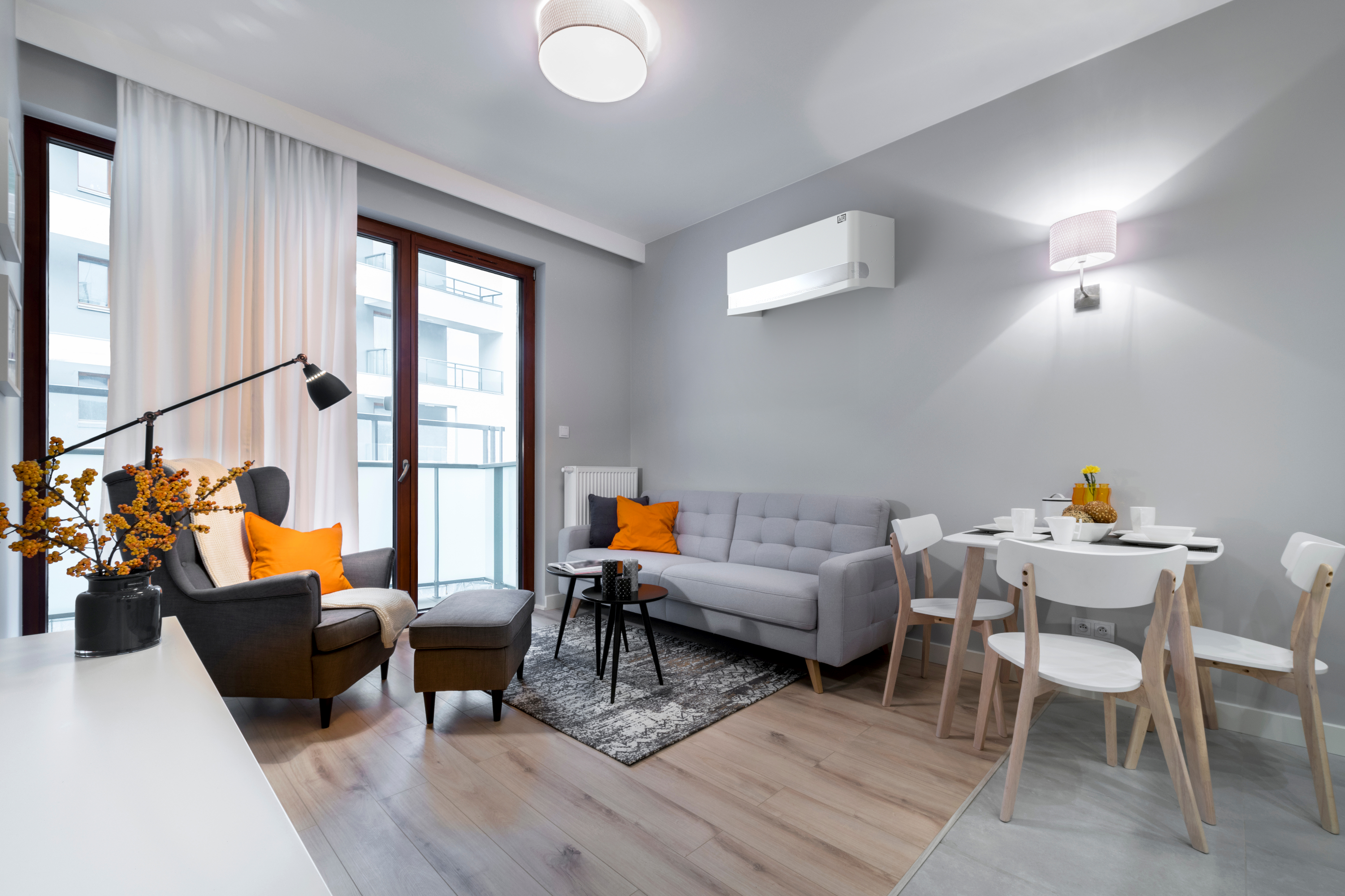 Talia indoor AC cover – sleek white design for Scandinavian-style studio in northern metropolis. Compatible with Panasonic CU-TZ50ZKE indoor split air conditioning unit.